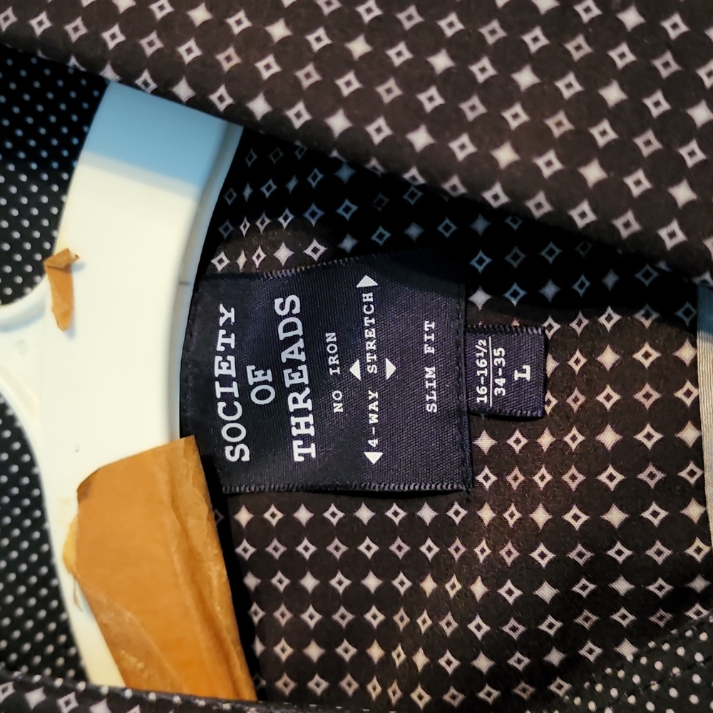 Black button down shirt.size large non iron material great for work.